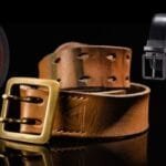Premium leather belts in various styles, including a rugged brown belt with a brass buckle and sleek black and brown belts with modern metal buckles, displayed against a black background.