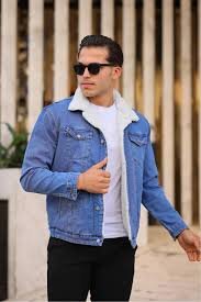 a person in a denim jacket