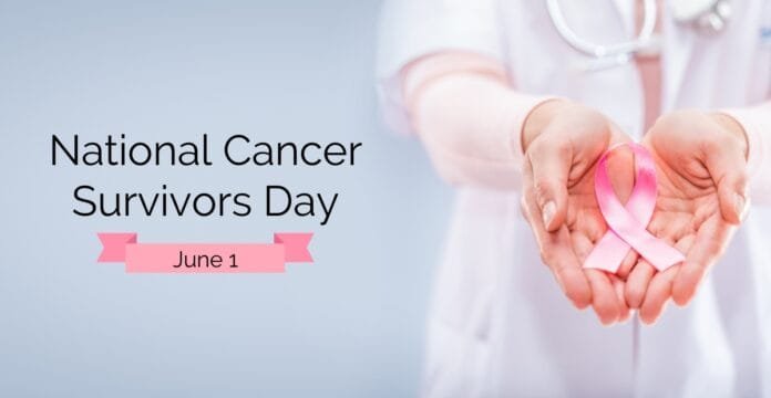 A smiling group of diverse cancer survivors wearing ribbons and holding hands at a community awareness event.