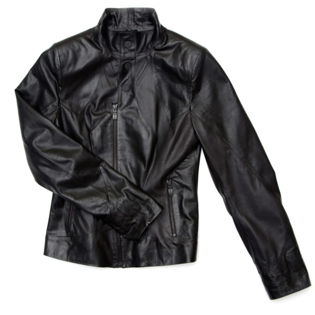 A black men's windbreaker jacket with a high collar, multiple zippered pockets, and a sleek leather-like finish, designed to block the wind.

