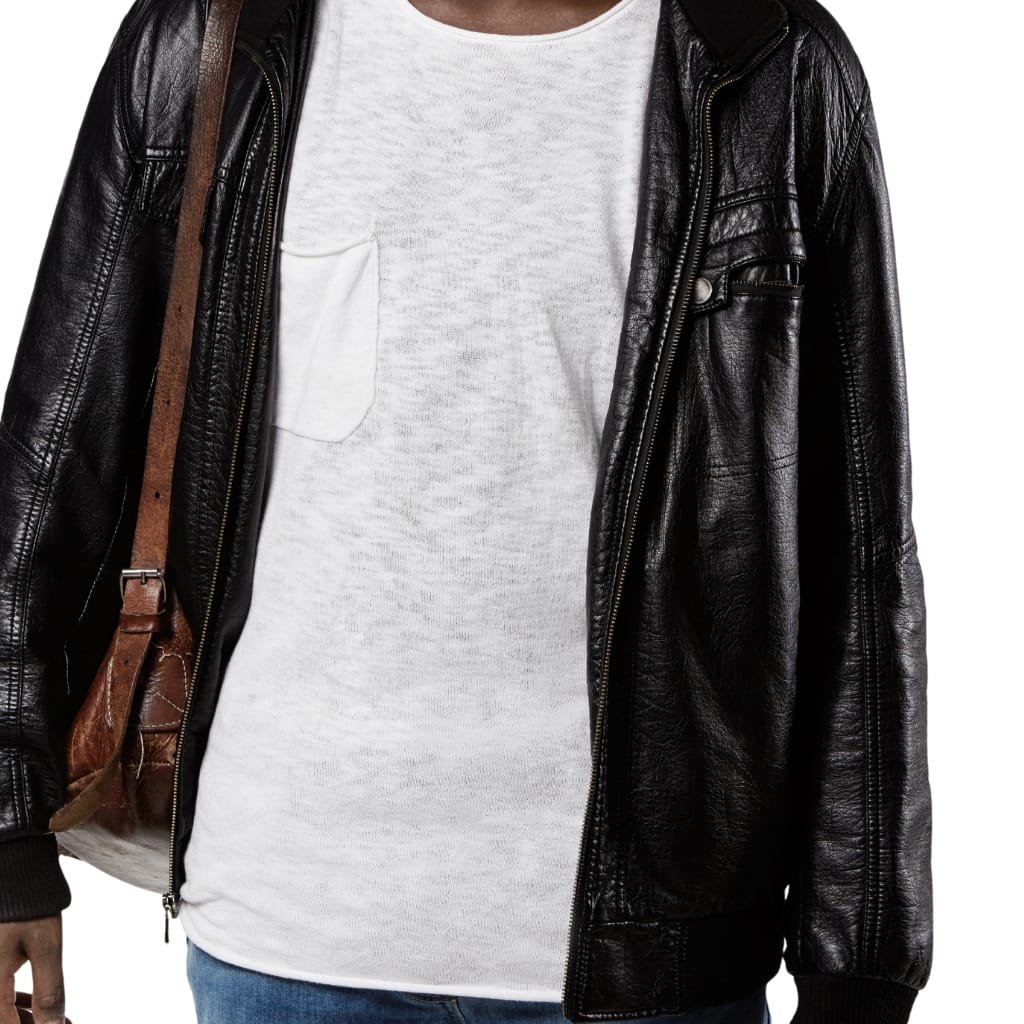 A person wearing a black goatskin leather jacket over a light-colored shirt, with part of a brown shoulder bag visible.