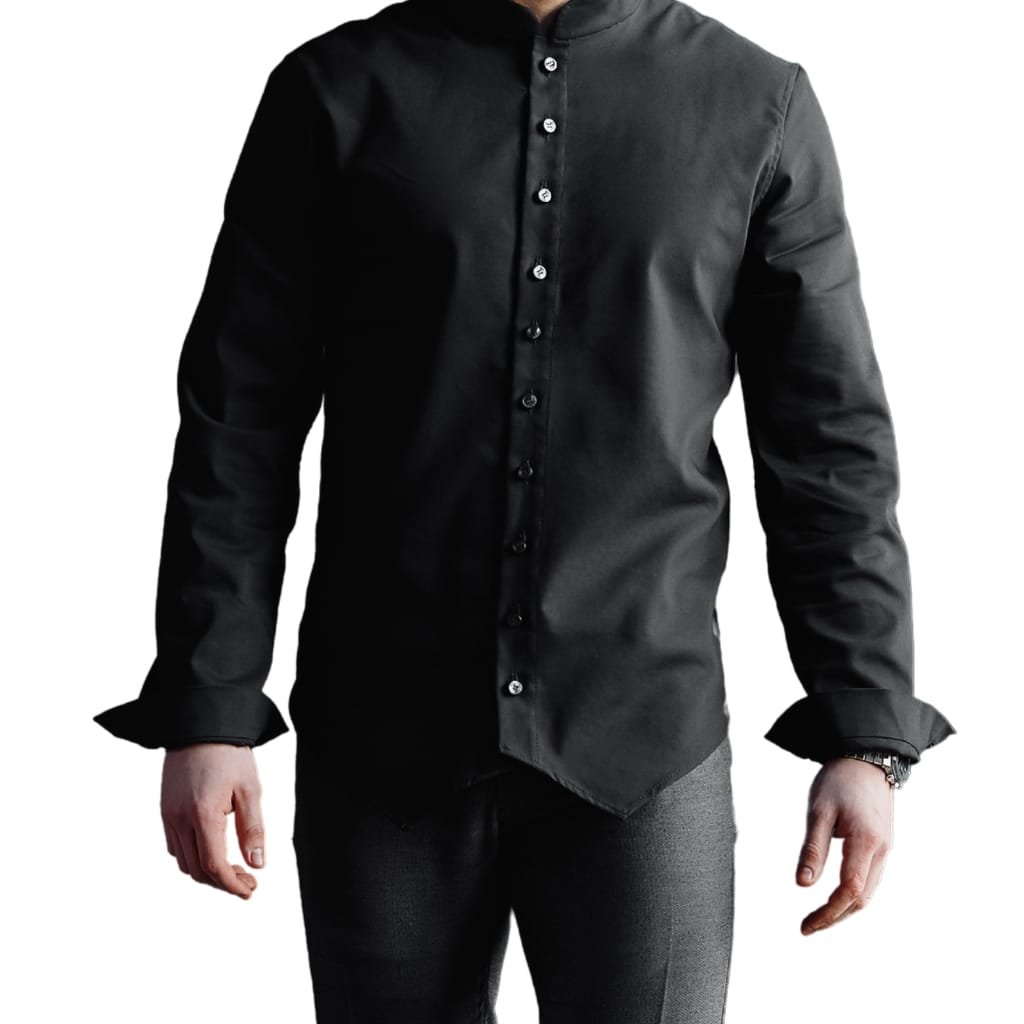 A minimalist, modern black shirt jacket with a slim fit, featuring a mandarin collar and button closure down the front, with slightly rolled-up sleeves.
