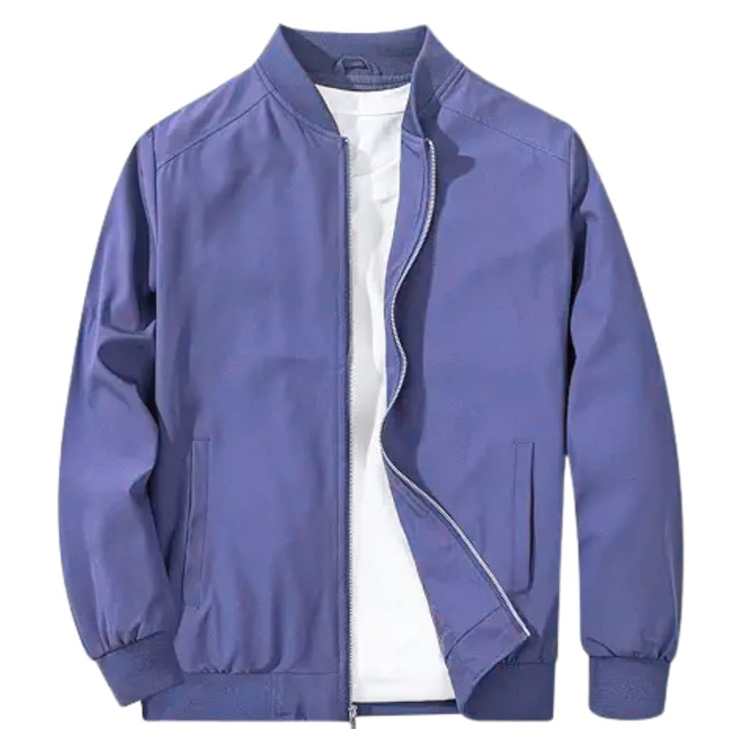 A men's blue windbreaker jacket with a full front zipper, ribbed cuffs and hem, and a casual look, layered over a white shirt.

