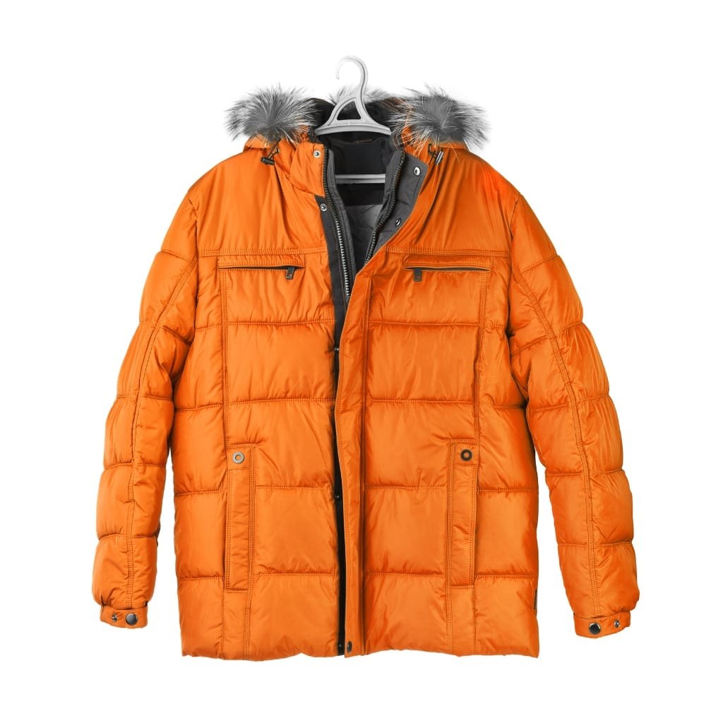 An orange ski jacket with a detachable faux fur-lined hood, multiple zippered pockets, and buttoned cuffs displayed on a hanger.

