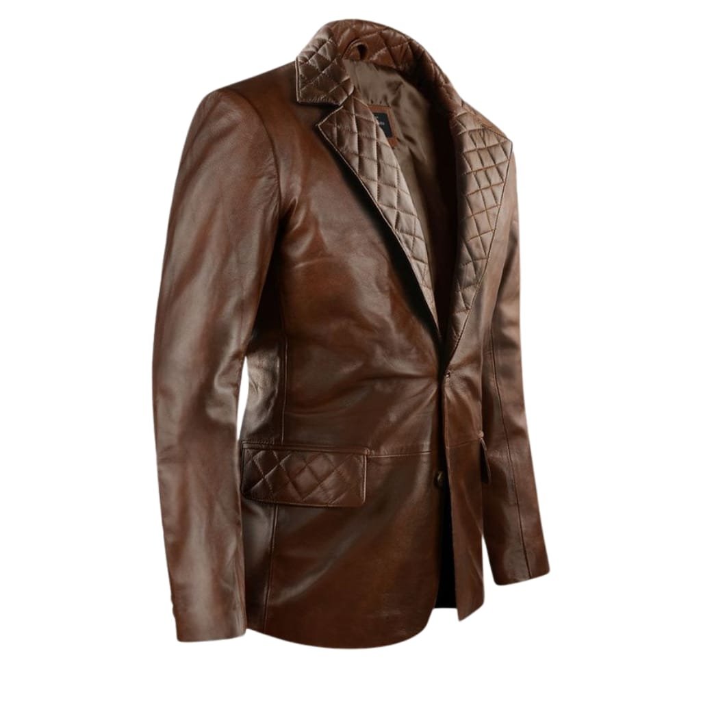 A stylish brown leather blazer-style jacket with quilted detailing on the lapel, pocket flaps, and shoulders.

