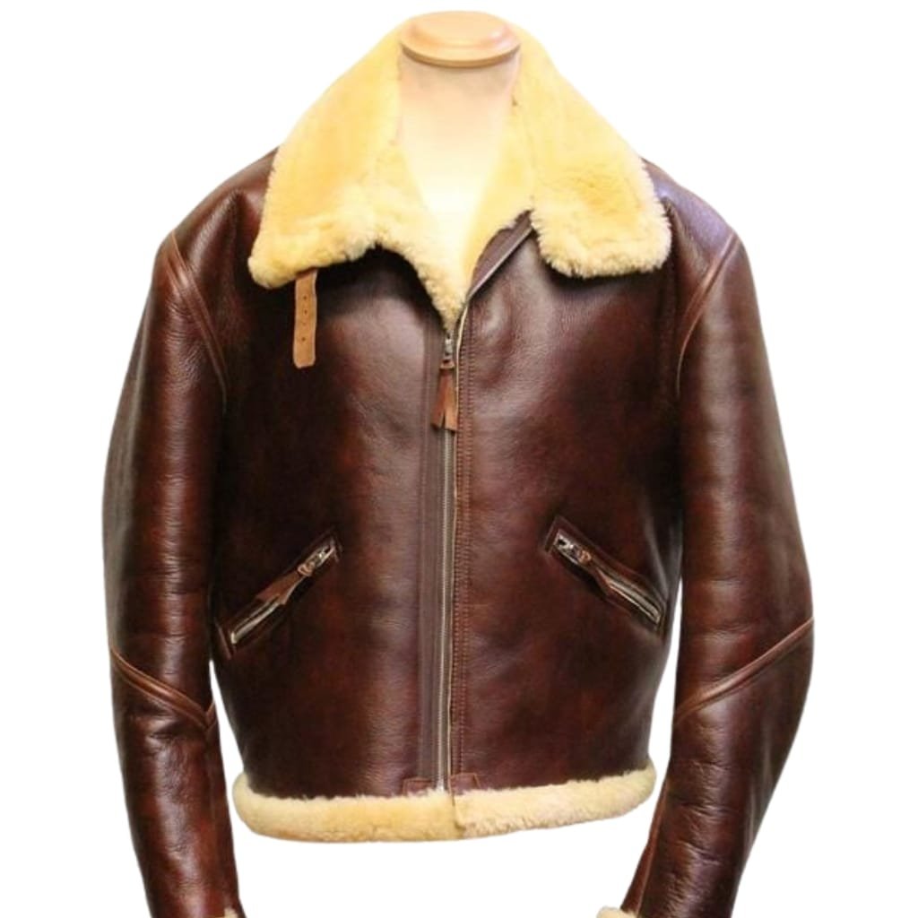 A brown leather flight jacket with a cream-colored shearling collar and trim, featuring a front zipper and two zippered side pockets.

