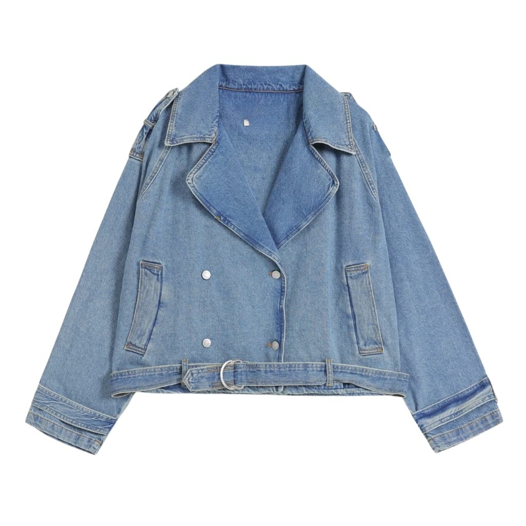 A light blue double-breasted denim jacket with a belt at the waist, featuring shoulder epaulets and four front pockets. The jacket has a relaxed fit with cuffed sleeves.