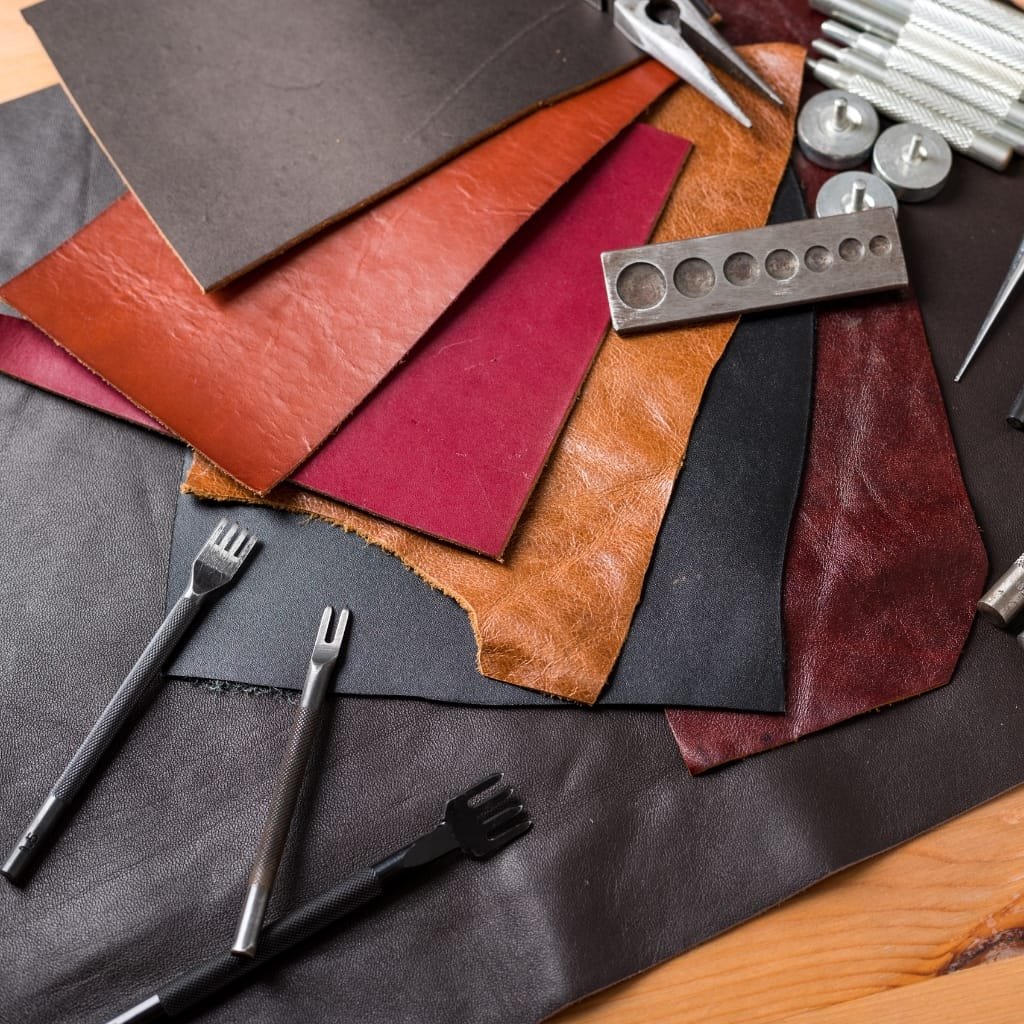 Icons and logos representing various leather certifications such as LWG, OEKO-TEX, and USDA BioPreferred.