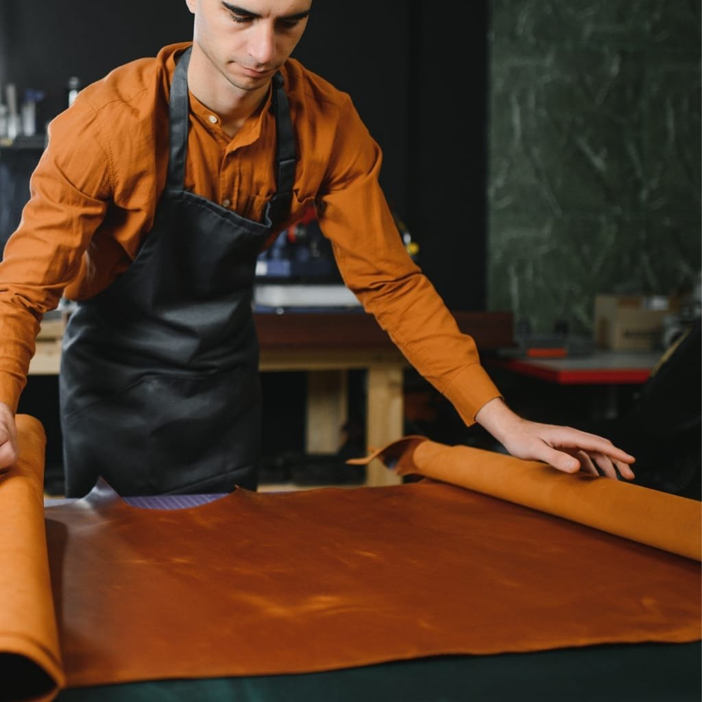 Leather production process showing key steps to make flexible buffalo leather, including tanning, conditioning, and drying.