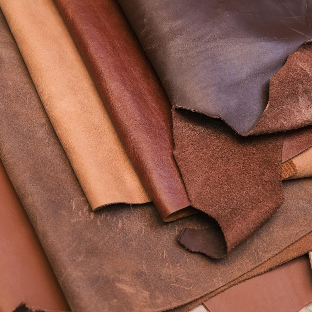 Close-up texture of flexible buffalo leather showing its natural grain and smooth flexibility.