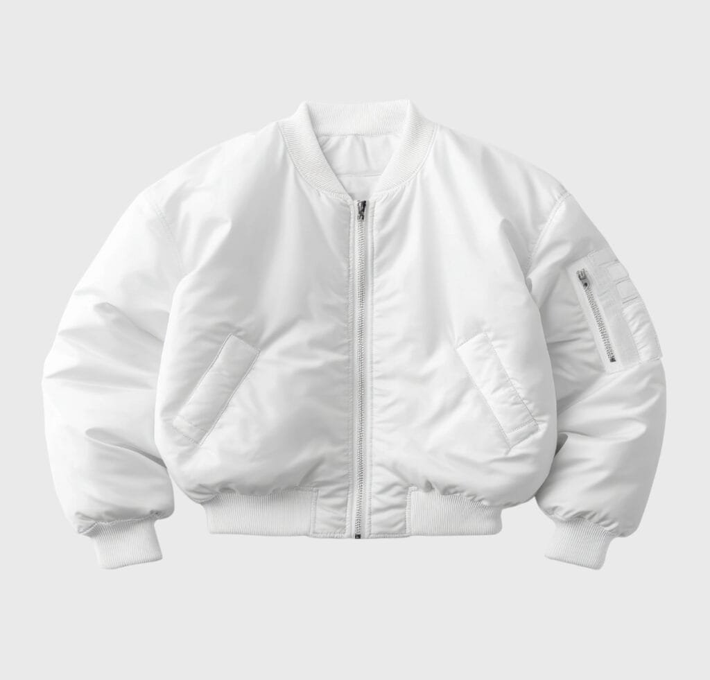 “White B-15 bomber jacket with front zipper, ribbed cuffs and hem, two angled front pockets, and a zippered sleeve pocket.”