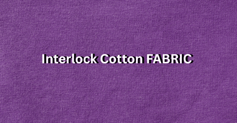 Close-up view of purple interlock cotton fabric with a uniform knit pattern." Caption: "Interlock Cotton Fabric in rich purple.