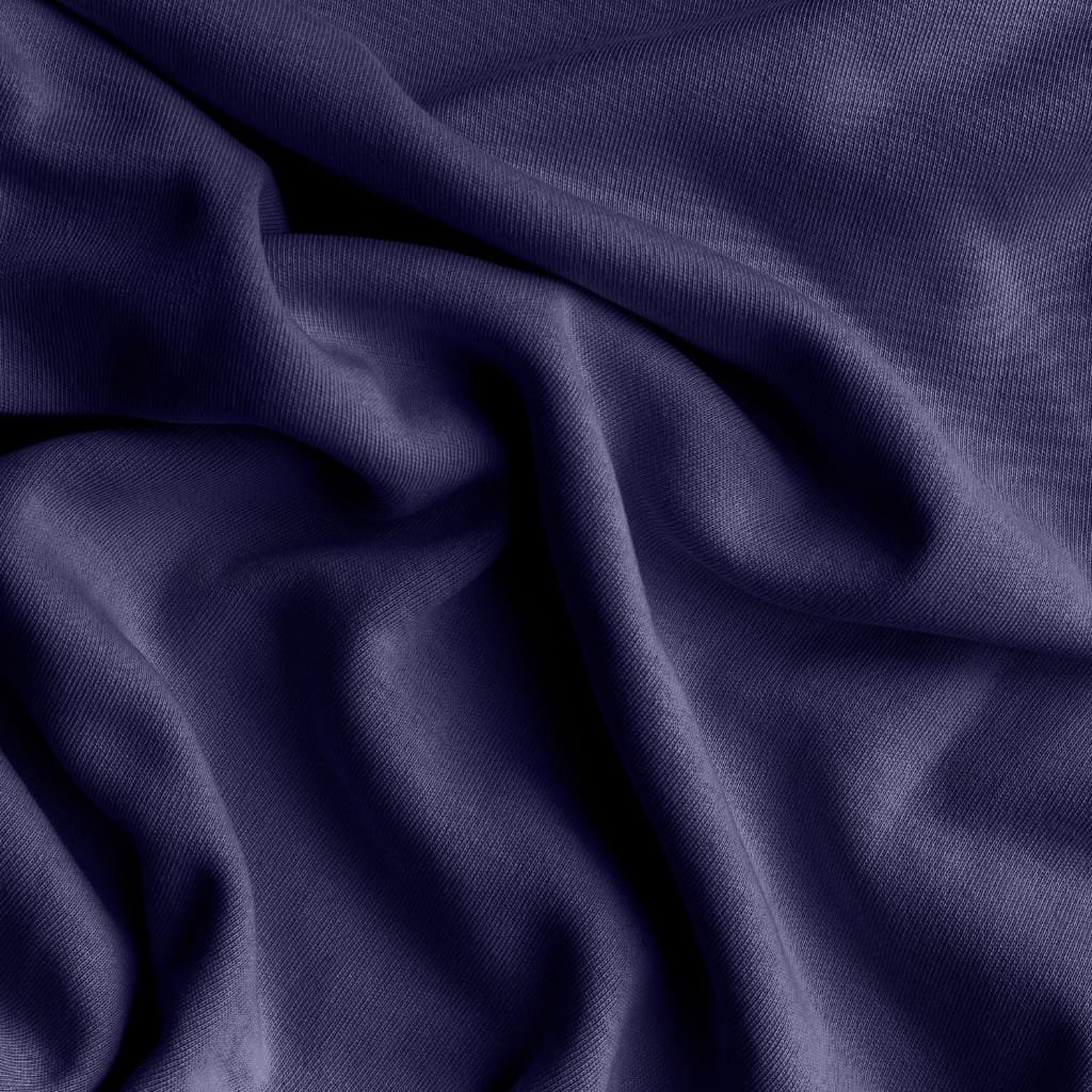 Close-up view of soft, flowing dark purple fabric with smooth folds and a textured weave. Jersey Cotton Fabric