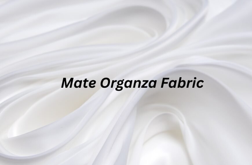 Close-up view of white Mate Organza fabric with soft folds and a smooth matte sheen.