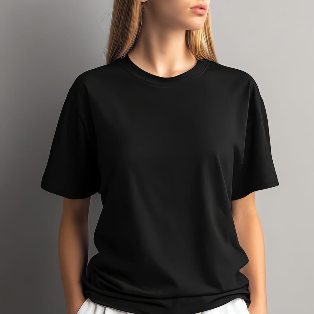 "Woman wearing a plain black short-sleeve T-shirt against a neutral background"
"Close-up of a black crew-neck T-shirt on a model"
