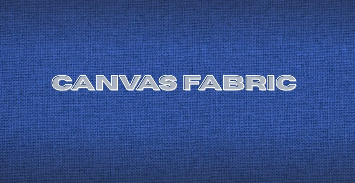 Blue canvas cotton fabric with a textured weave and subtle shading.