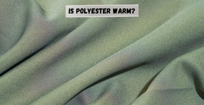 Close-up of green polyester fabric with a question 