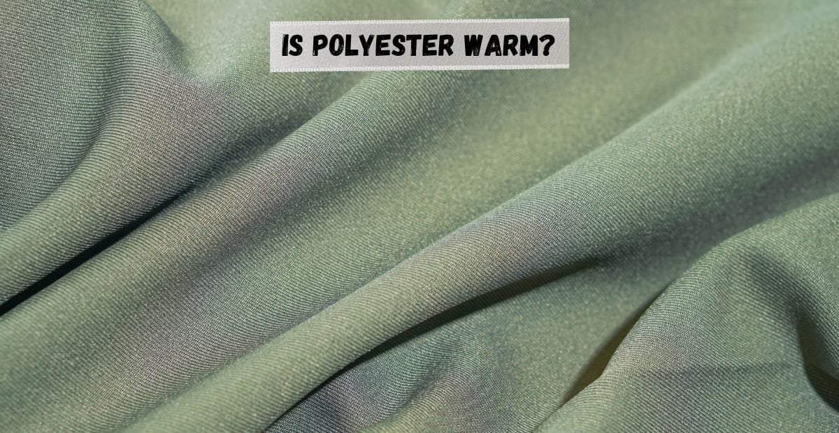 Close-up of green polyester fabric with a question "Is polyester warm?"