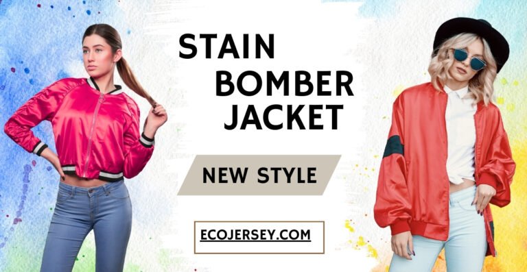 "Two models wearing bright bomber jackets: a pink satin bomber on the left and a red satin bomber on the right, against a colorful splash background. Text reads 'STAIN BOMBER JACKET' with a beige banner saying 'NEW STYLE' and the website 'ECOJERSEY.COM' at the bottom."