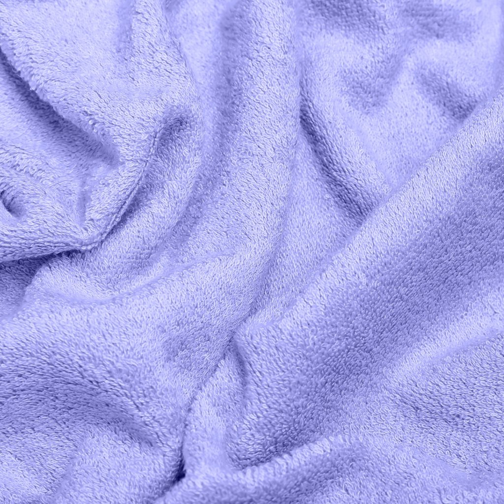 A soft lavender-colored towel or blanket with textured fabric and folds.