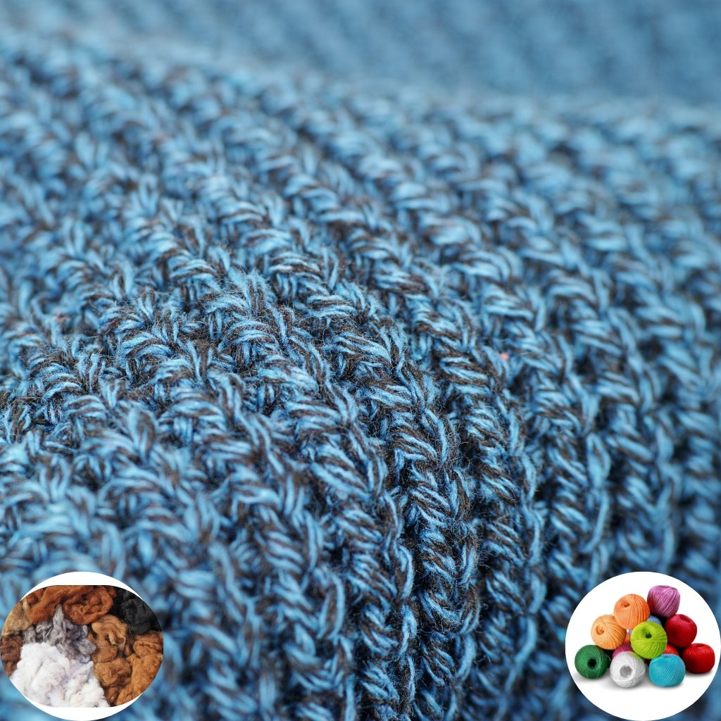Close-up view of a blue knitted fabric with textured, looping stitches.