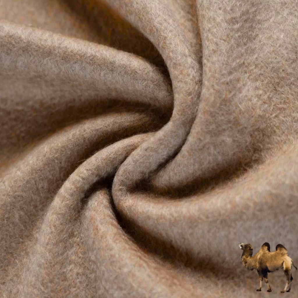 A close-up shot of soft, beige-brown woolen fabric with folds and textures. In the bottom-right corner, a small camel stands, adding a whimsical element to the scene.