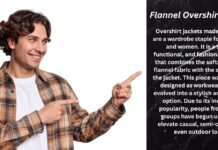 Flannel Overshirt Jacket for Warmth, Comfort, and Daily Style Young man wearing a brown plaid flannel shirt pointing to the right with a white t‑shirt underneath, against a split white and black textured background.