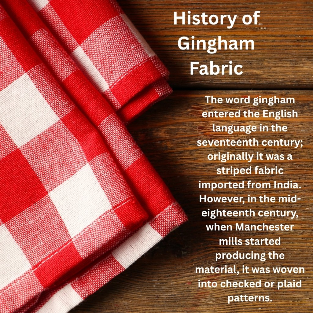 Red and white checkered gingham fabric folded on a wooden surface with a text overlay about the history of gingham fabric.