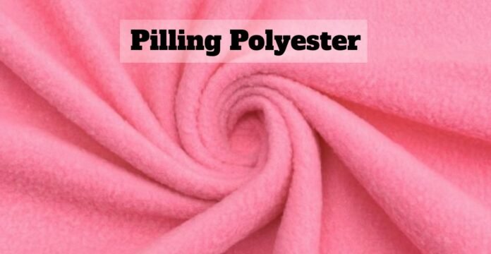 Low Pilling Polyester A pink fuzzy fabric swirled into a spiral, showing soft, plush texture. Low Pilling Polyester