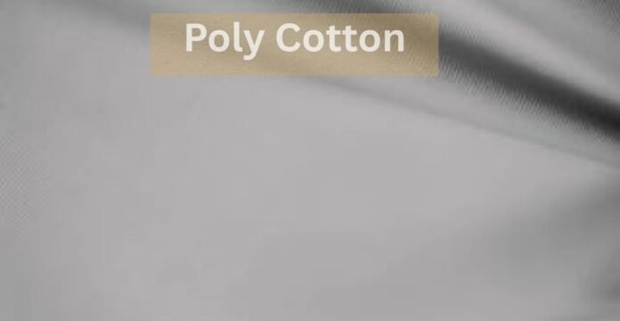 A close-up image of smooth poly cotton What Is Poly Cotton Fabric?fabric with a beige label reading “Poly Cotton,” illustrating textile texture for discussing topics like does polyester make you sweat'what is poly cotton fabric