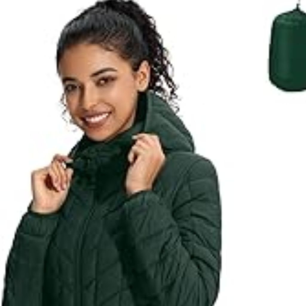 Waterproof or Water-Resistant Puffers: What You Should Know 17 A man wearing a color-blocked puffer jacket with a beige hood and shoulders, green body, and black sleeves, standing against a plain white background.Waterproof or Water-Resistant Puffers