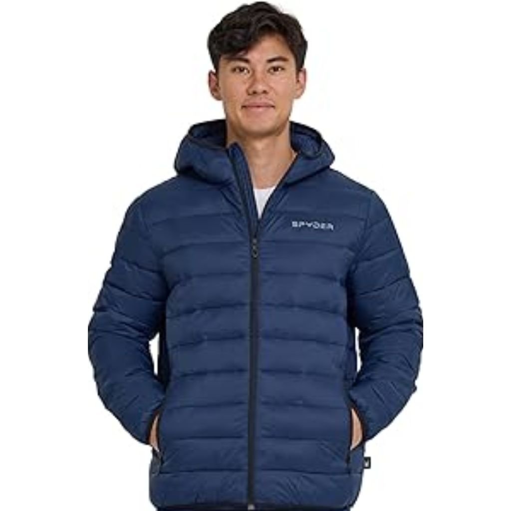 Waterproof or Water-Resistant Puffers: What You Should Know 21 A man wearing a color-blocked puffer jacket with a beige hood and shoulders, green body, and black sleeves, standing against a plain white background.Waterproof or Water-Resistant Puffers