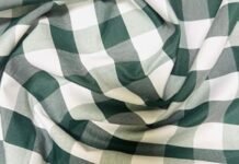 1. What Is Poplin Fabric? A Complete Guide to This Smooth, Breathable Textile "Green and white checked textile showing texture and weave, illustrating what is poplin fabric."