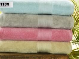 Stack of hygro cotton towels in various colors.________what is hygro cotton?