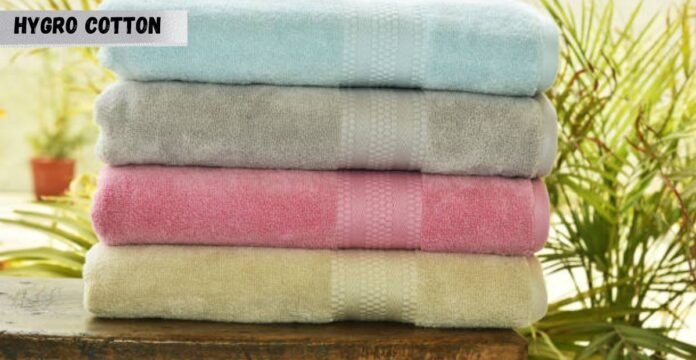Stack of hygro cotton towels in various colors.________what is hygro cotton?