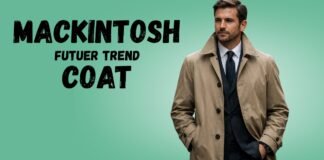 Mackintosh Coat Guide its History Style and Uses A stylish man wearing a tan Mackintosh future trend coat over a dark suit and tie, standing against a green gradient background.