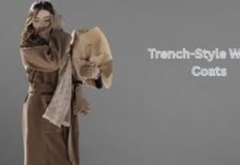 Trench-Style Winter Coats: Timeless Warmth and Style Guide Woman wearing a beige trench-style winter coat with a scarf, holding a bouquet against a minimalist grey background.Trench-Style Winter Coats