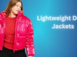 Woman wearing a bright pink lightweight down jacket, styled for warmth and comfort in cool weather.Lightweight Down Jacket