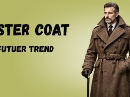 Ulster coat model in a long brown wool trench with a belt and cane, against a light olive background.