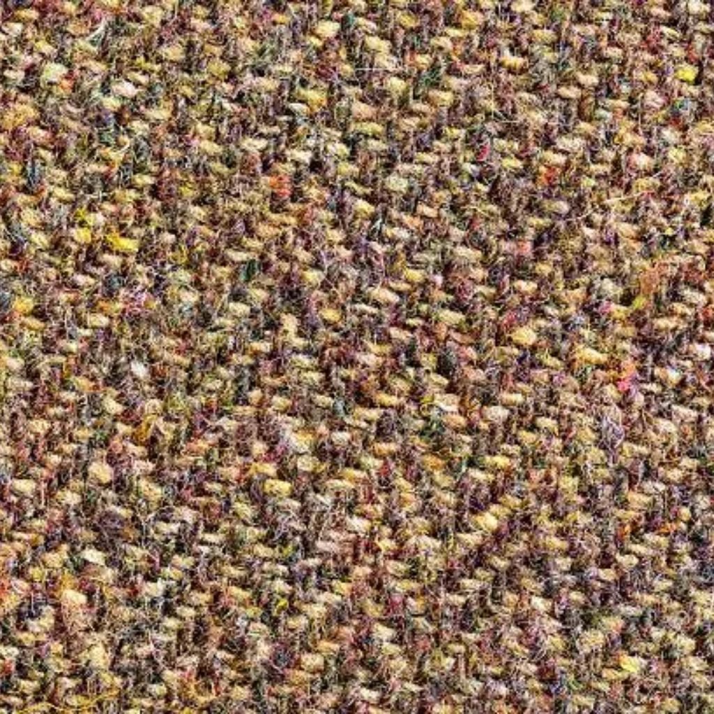 Close-up of soft gray plush fabric with a dense, fluffy texture and layered folds.Is Herringbone Wool Worth It?