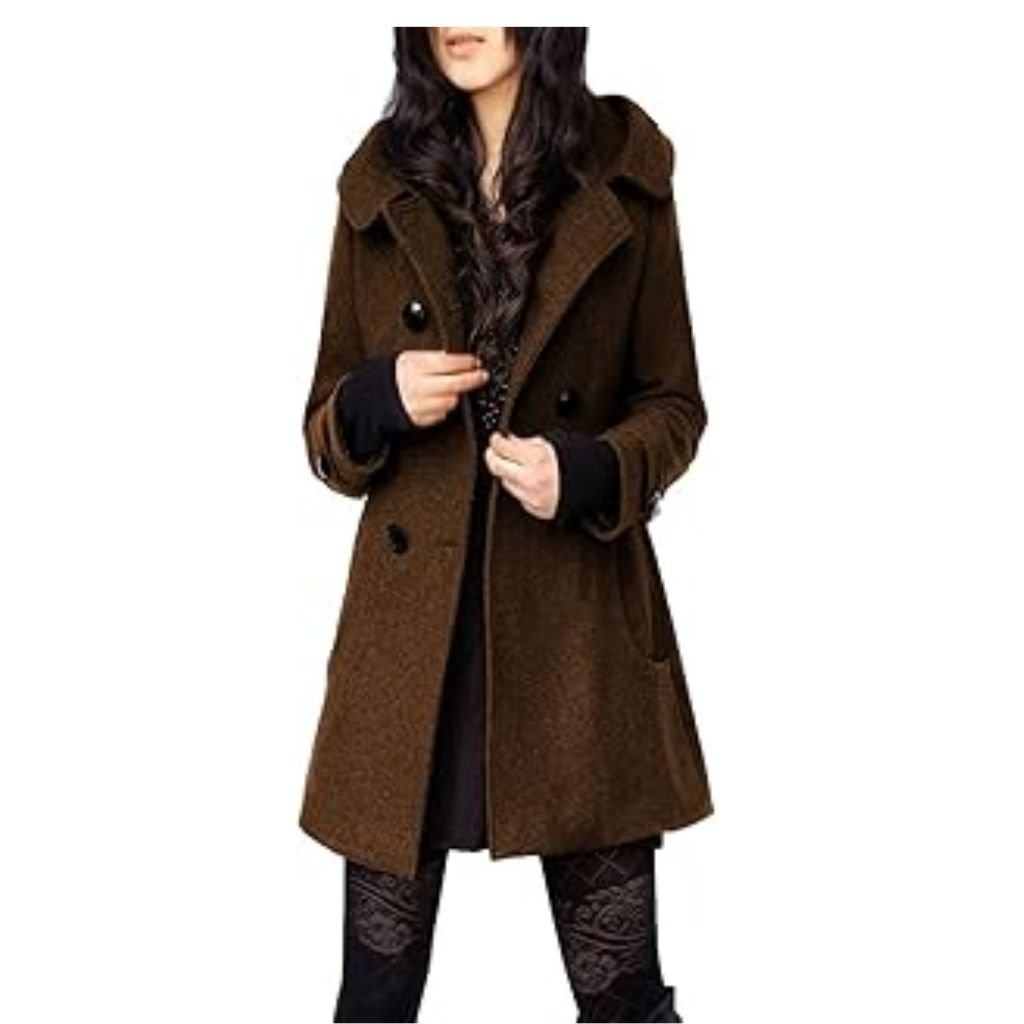 A woman wearing a brown double-breasted wool coat with a wide collar, styled with patterned black leggings.Teddy Coats
