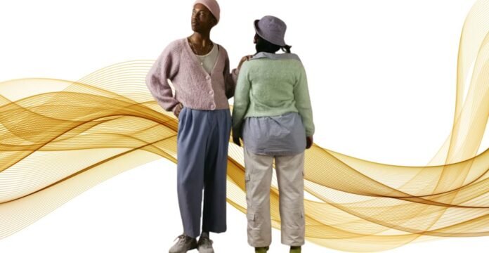 Two individuals wearing pastel cardigans styled with relaxed, casual outfits against an abstract golden wave background.trendy cardigan outfits