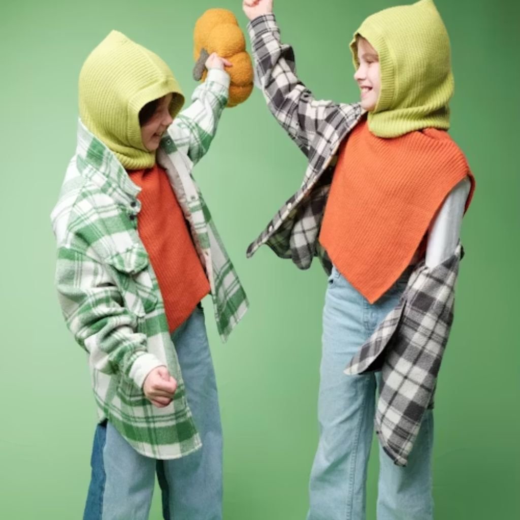 "Brown button-up cardigan with gold buttons and front pockets."trendy cardigan outfits