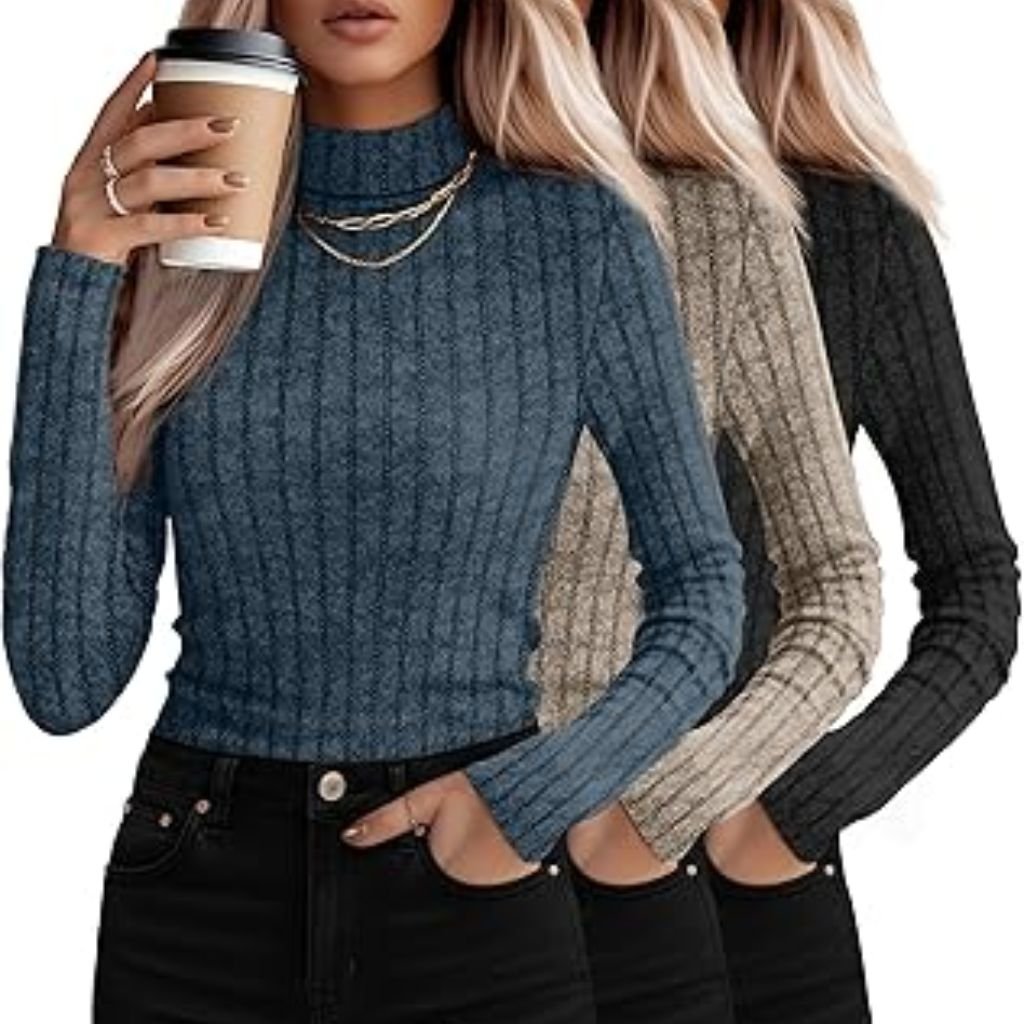 A woman wearing a light gray oversized mock-neck sweatshirt paired with black pants, posing with one hand tucked into the hem of the sweatshirt.Why Mock neck turtlenecks