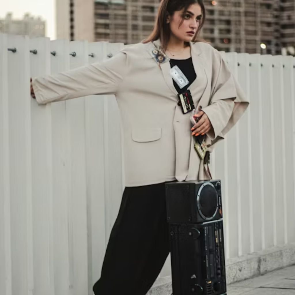 "Brown button-up cardigan with gold buttons and front pockets."trendy cardigan outfits