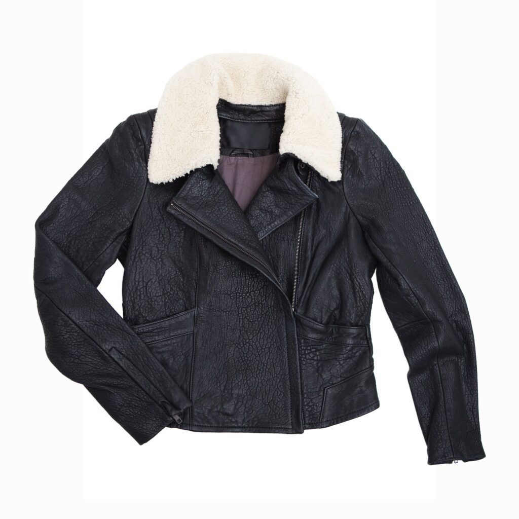 Black biker-style leather jacket with a cream shearling collar, zipped front, and angled pockets.