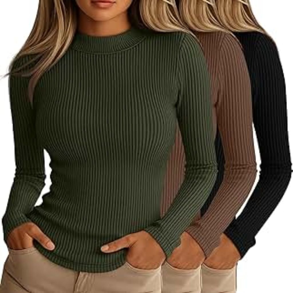 A woman wearing a light gray oversized mock-neck sweatshirt paired with black pants, posing with one hand tucked into the hem of the sweatshirt.Why Mock neck turtlenecks