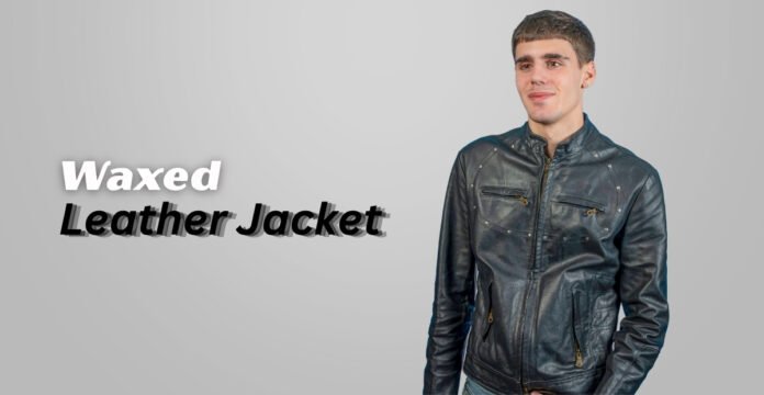 Waxed leather jacket with a glossy, weatherproof finish, classic motorcycle-inspired design, front zipper, and multiple pockets.