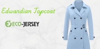 Edwardian Topcoat: Timeless Elegance for Modern Wardrobes. Light blue Edwardian-style trench coat with a belt and double-breasted buttons, shown against a marble background with the words 'Edwardian Topcoat' and a logo that reads Eco-Jersey. Edwardian Topcoat