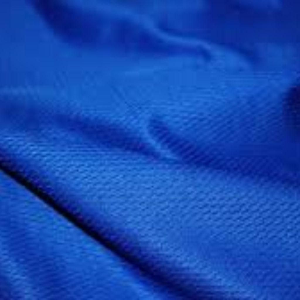 A close-up of vibrant blue fabric with a smooth, satiny texture and soft folds.

Moisture-Wicking Winter Fabric Explained: